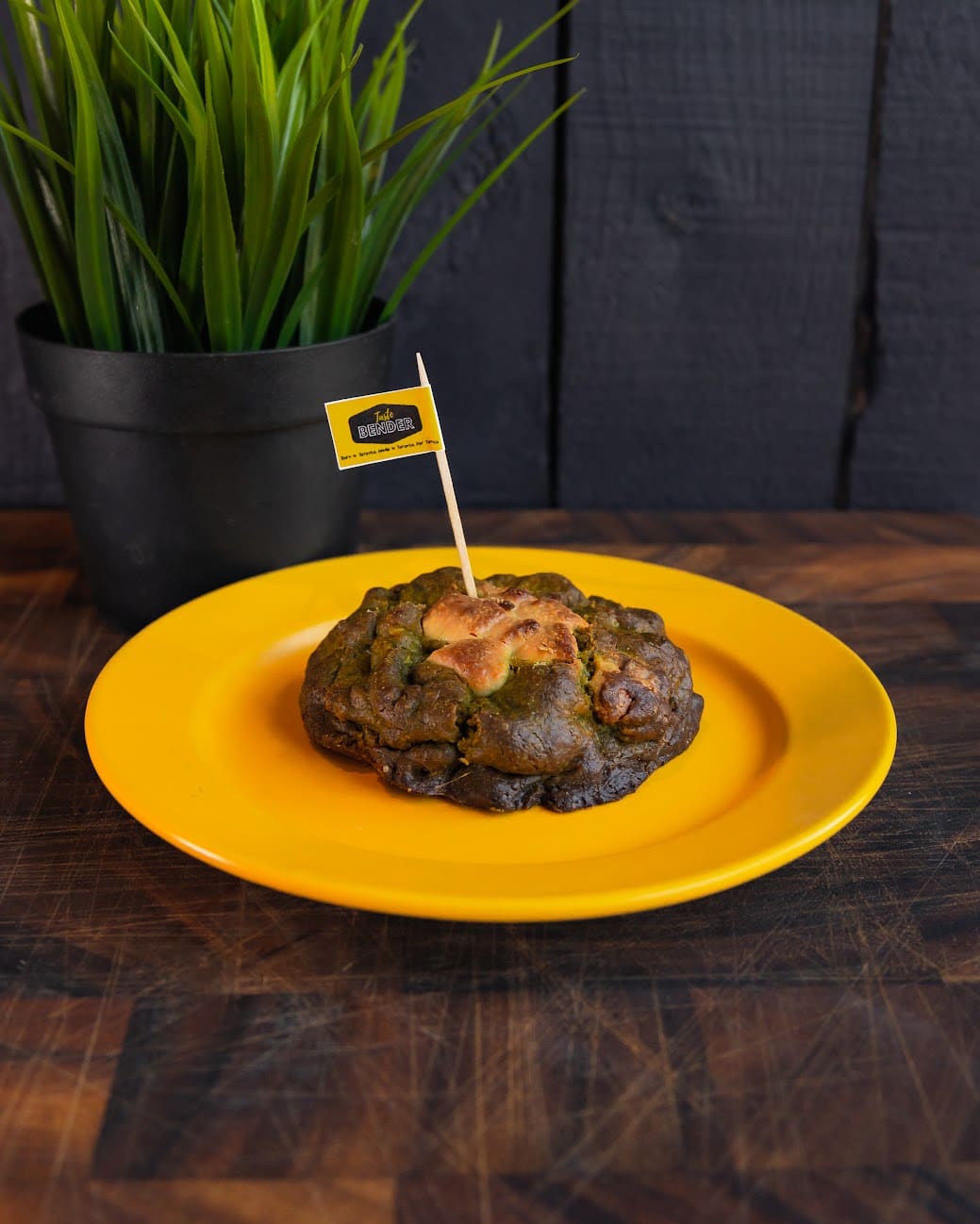 A Taste Bender cookie on a yellow plate