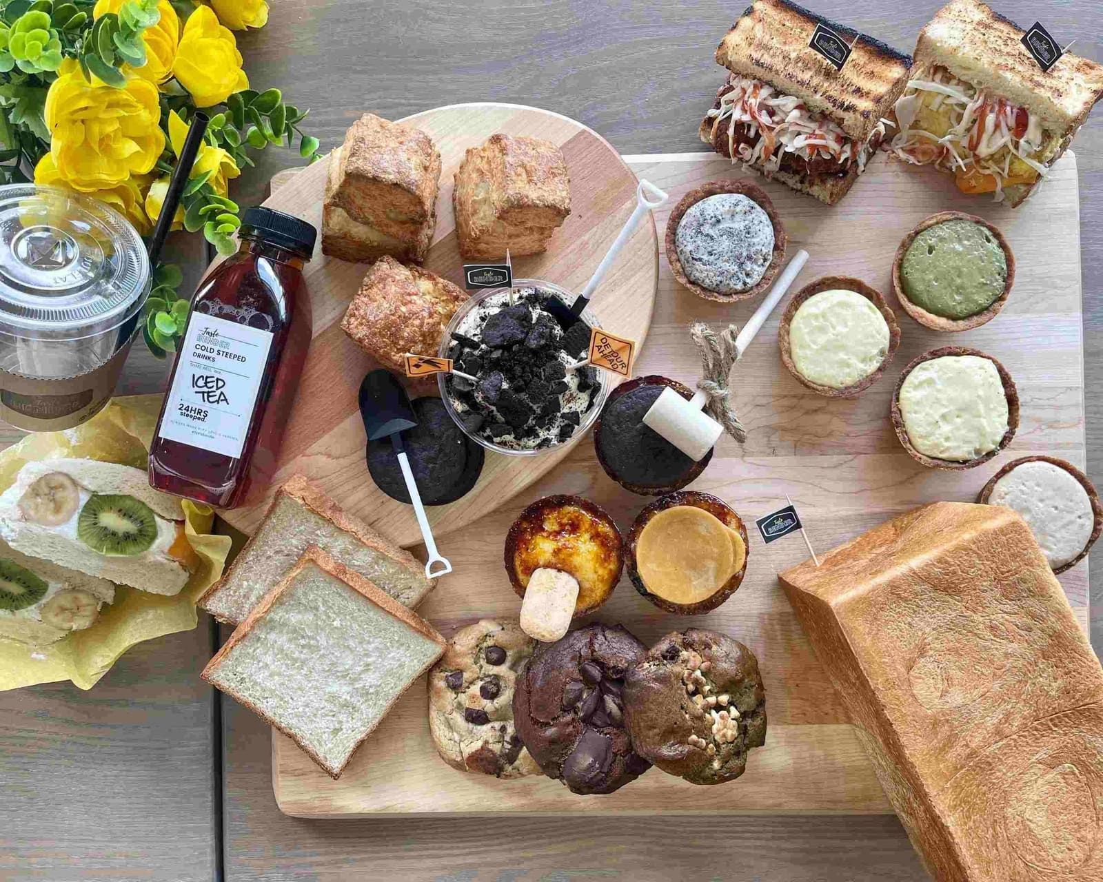 A spread of Taste Bender sandwiches, fresh biscones, desserts and drinks